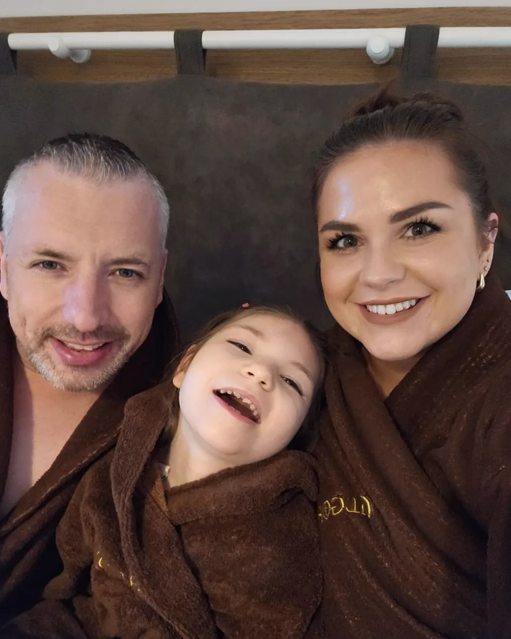 Jorja with her family in dressing gowns
