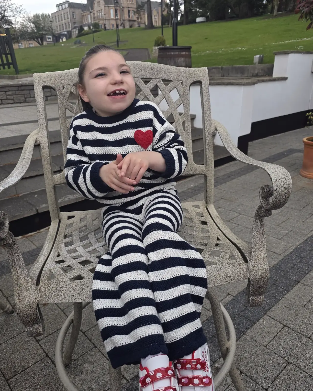 Jorja in the garden chair